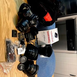 Selling my DSLR NIKON-D-610used with 3 extra lenses, camera bah and remote.